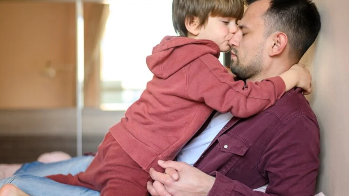 father son kiss