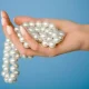 pearls in hand