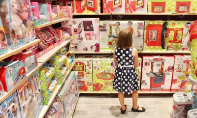 Girl in doll shop