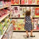 Girl in doll shop