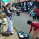 A foreign tourist Gokarna making money