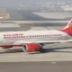 A Man pees on female passenger In Air India Flight