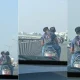 Lovers Scooter Ride kissing on road