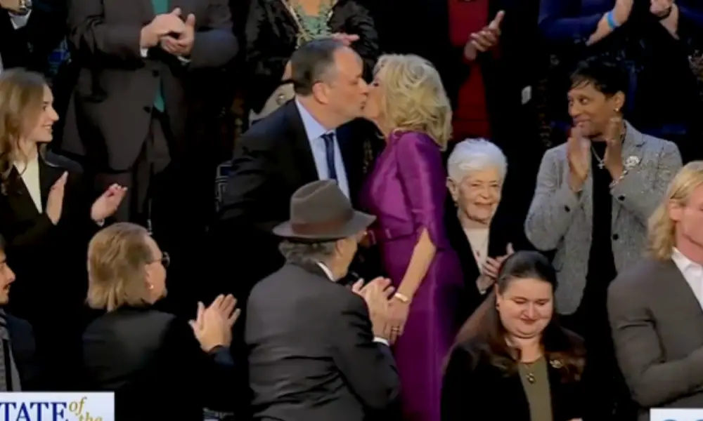 Joe Biden Wife Jill Biden kisses Kamala Harris Husband Doug Emhoff
