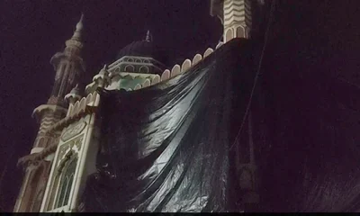 Aligarh mosque covered ahead of Holi Festival