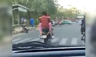 Video of couple romancing on motorbike on Holi eve goes viral