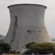 85-metre-tall cooling tower reduced to ashes within 7 seconds in Surat