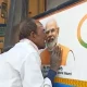 Karnataka Farmer Kisses Narendra Modi Photo On Bus