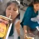 A lady Burning Manusmriti And Lit cigarette While Making chicken video Viral