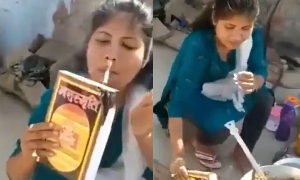 A lady Burning Manusmriti And Lit cigarette While Making chicken video Viral