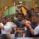 Ajay Devgn hand away from fan at his birthday