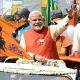 Saffron flags with anjaneya will wave During Modi Roadshow In Bengaluru