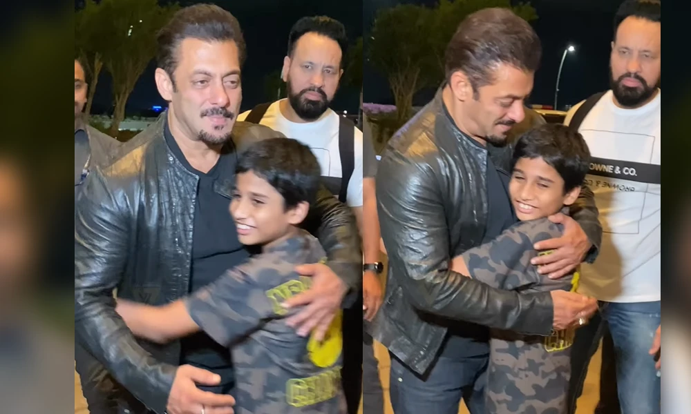Salman Khan hugs a young fan at airport