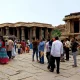 Tourists viewing the famous stone chariot of Hampi