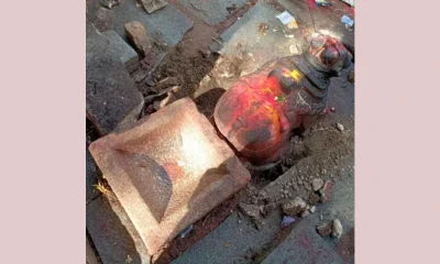 Digging around Nandi idol for treasure at shira