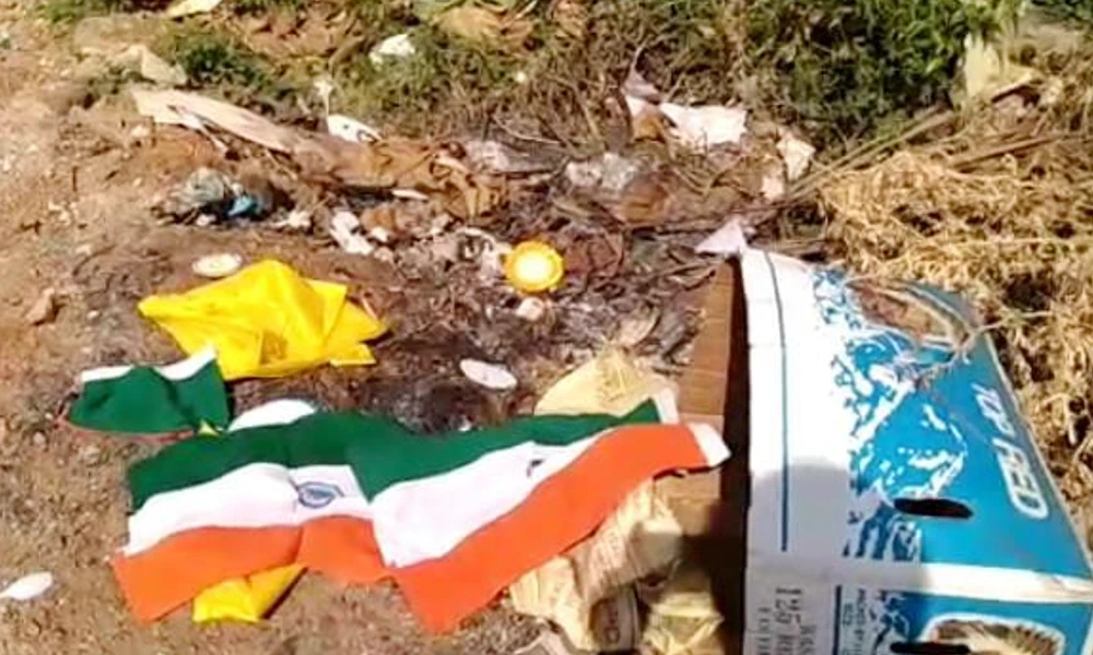 National flag thrown at dustbin