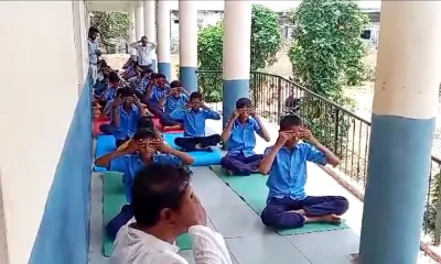 Students practicing yoga at Hulasur Government High School