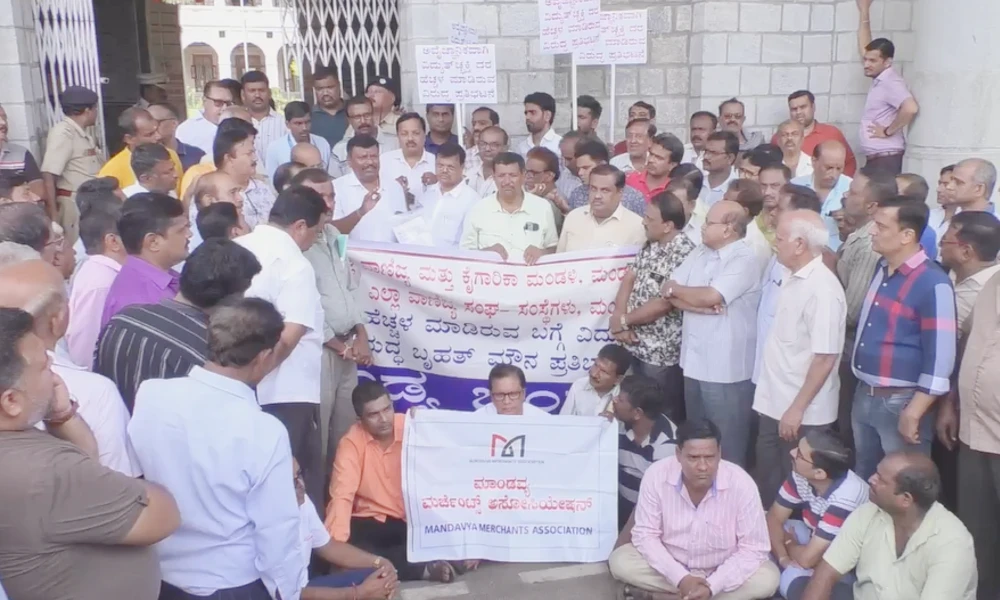 Traders businessmen protest at mandya