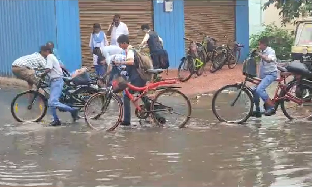 Rain in kolar students cyling
