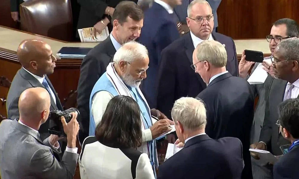 PM Modi Giving Autograph to US Lawmakers