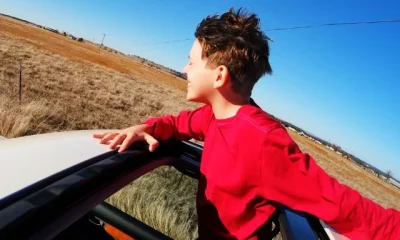 Boy on sunroof