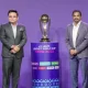 Former Indian cricketer Virender Sehwag, Secretary of Board of Control for Cricket in India Jay Shah, former Sri Lankan cricketer Muttiah Muralitharan and ICC chief Geoff Allardice pose with ICC Men's Cricket World Cup trophy during the announcement of match schedule.