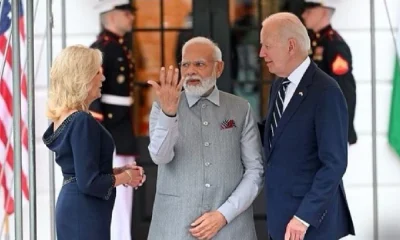 a picture of Prime Minister Narendra Modi with US President Joe Biden and the First Lady Jill Biden