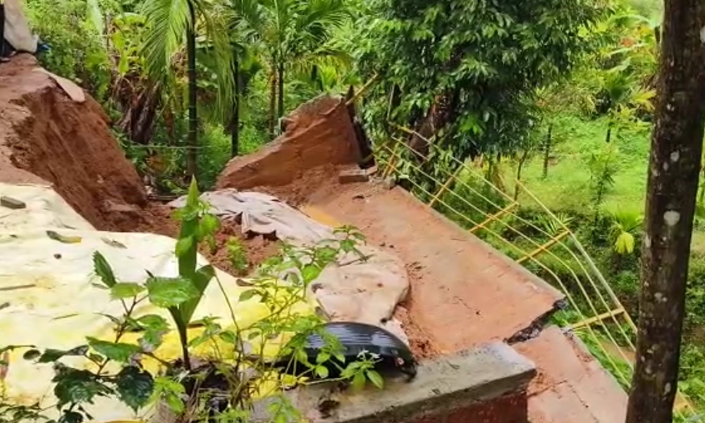 The retaining wall of the house in Kalasa taluk has collapsed