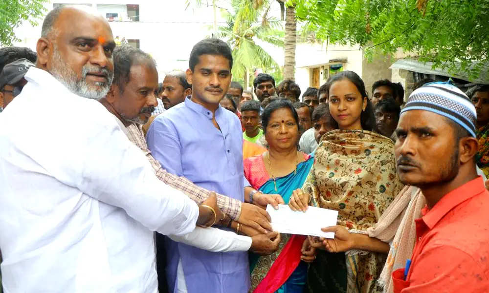 MLA Nara Bharat Reddy distributed a compensation check to the families of the deceased