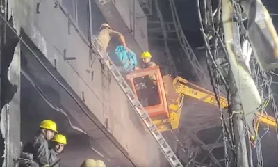 Firefighters In Building