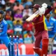 Keacy Carty goes inside out as Ishan Kishan reacts