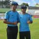 Yashasvi Jaiswal and Ishan Kishan pose after receiving their Test caps