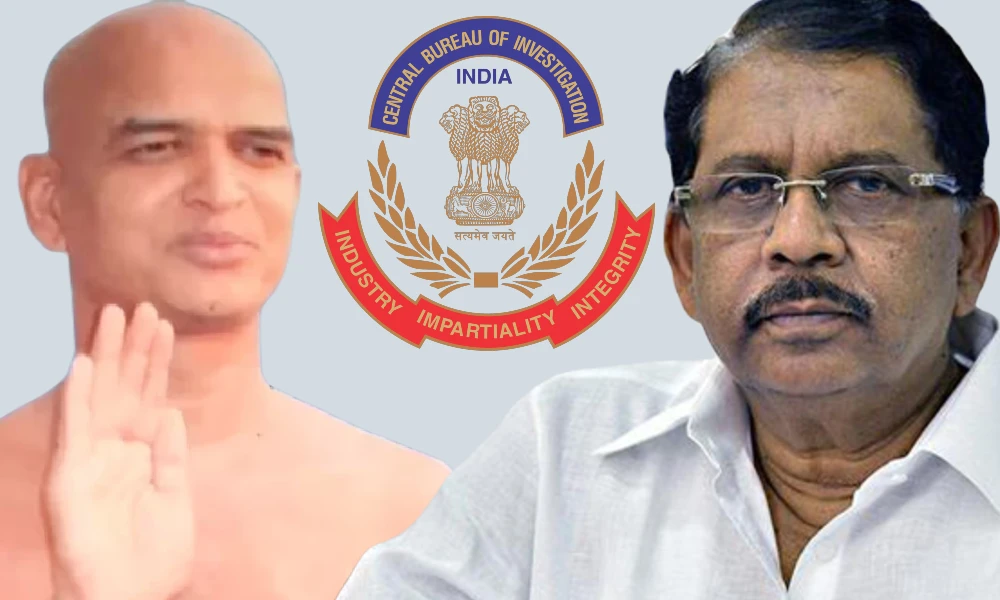 Kam kumar nandi maharaj and Dr G Parameshwar with CBI Logo