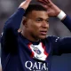 Kylian Mbappe celebrates after scoring his side's opening goal