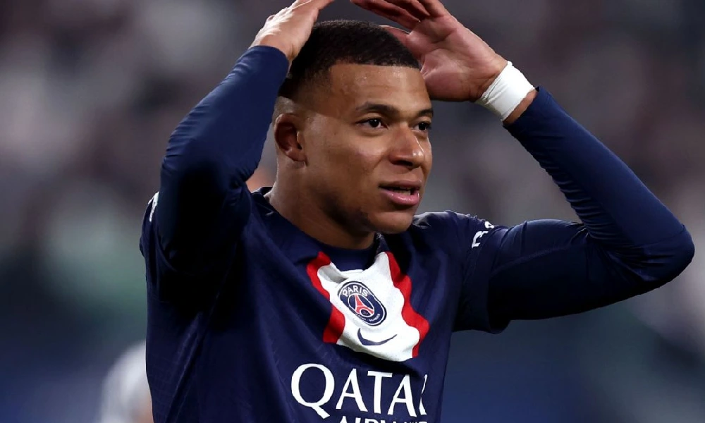 Kylian Mbappe celebrates after scoring his side's opening goal