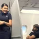 MS Dhoni sleeping on flight