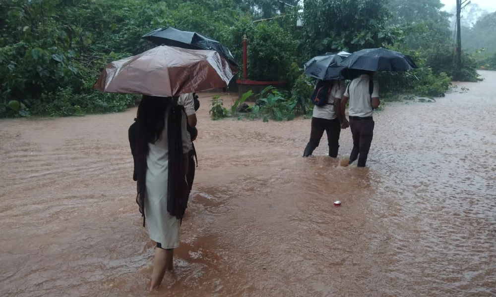 Rain Effect in mangaluru students running in rain