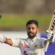 Pakistan's Saud Shakeel celebrates scoring a double century during the third day of the first cricket test match between Sri Lanka and Pakistan in Galle
