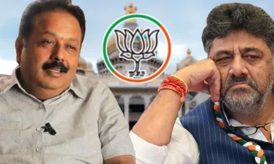 Chaluvarayaswamy and DK Shivakumar infront of Vidhana soudha and BJP Logo