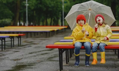 kids in rain boots and enjoying ice cream