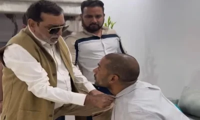 father holding the Dhawan collar