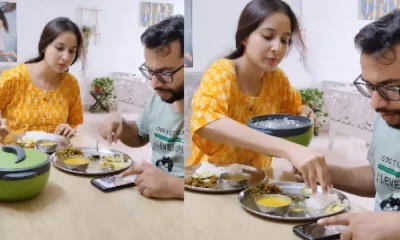 wife gives her food to husband