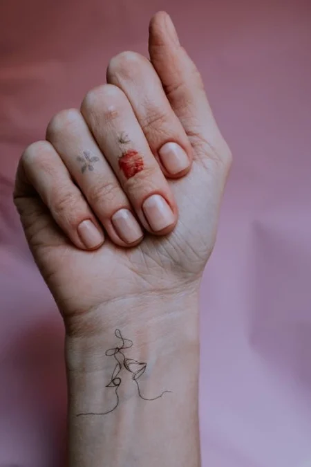 Hand finger tattoo that reflects personality