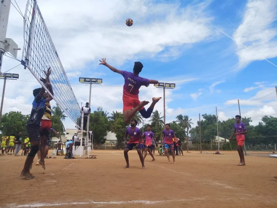 mens playing volleyball