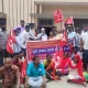 Protest demanding release of education subsidy for building construction workers at pavagada