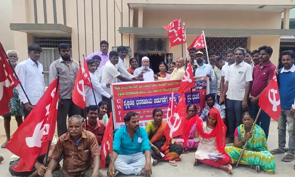 Protest demanding release of education subsidy for building construction workers at pavagada