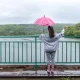 Girl standing in rain