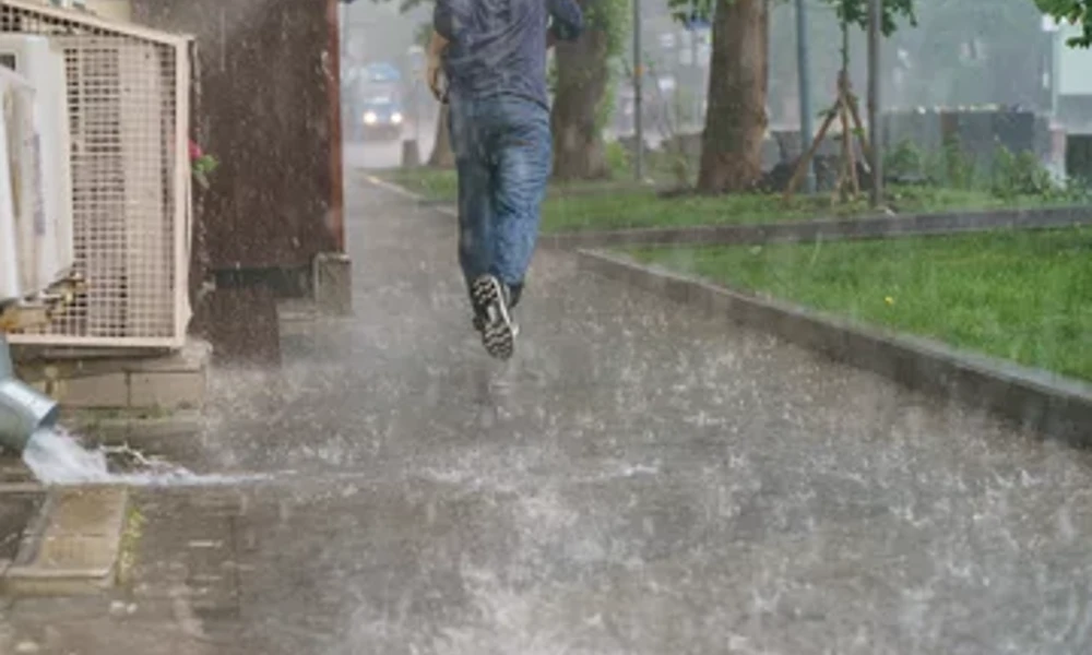 Boy running in Rain