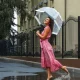 Rain girl standing in road