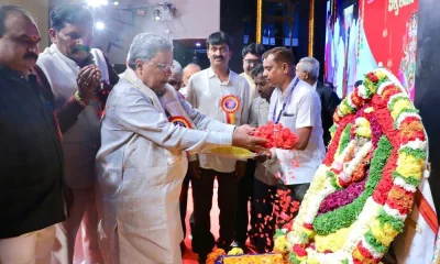 CM Siddaramaiah pays floral tributes to Vishwakarmas portrait